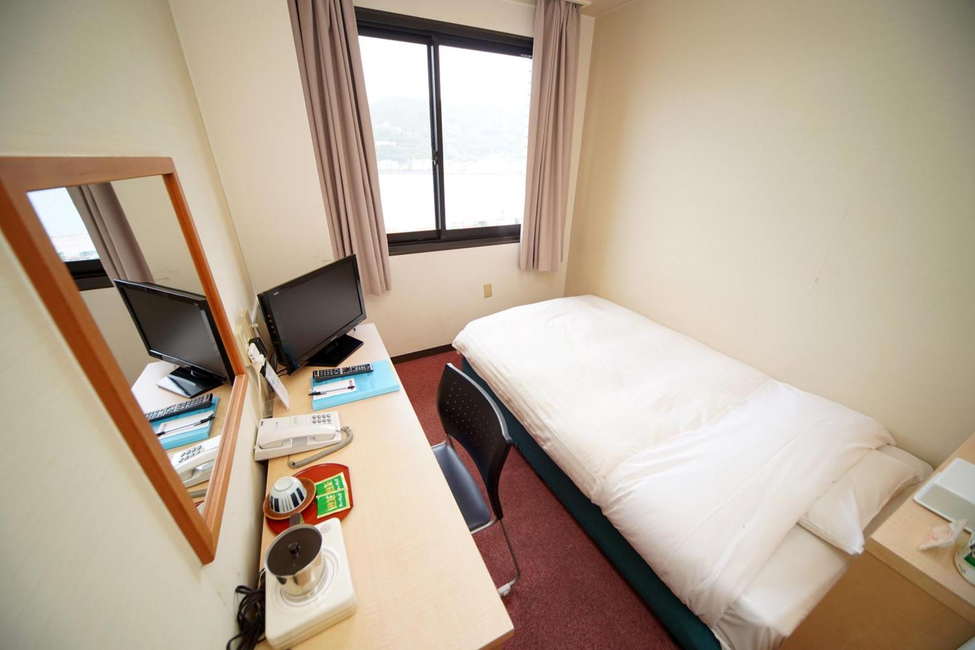 Amami Port Tower Hotel Екстериор снимка